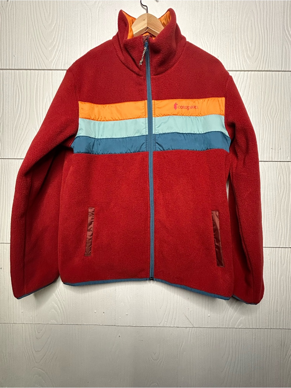 cotopaxi Red Fleece Jacket with Orange, Light Blue & Teal Stripes